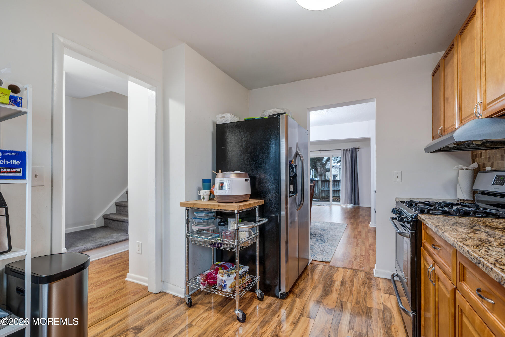 433 Bolton Road East Windsor, NJ 08520 - Photo 3 of 13 a living room with furniture and a flat screen tv