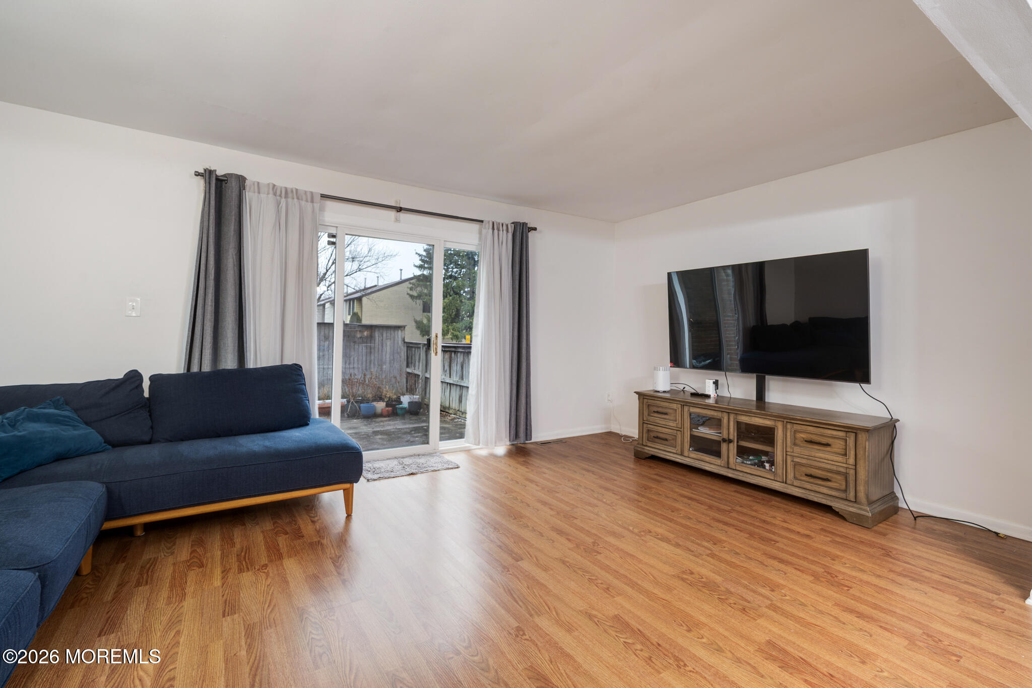 433 Bolton Road East Windsor, NJ 08520 - Photo 4 of 13 a living room with furniture and a flat screen tv