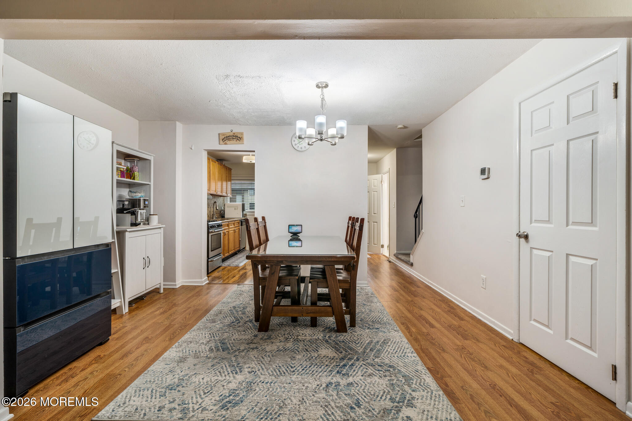 433 Bolton Road East Windsor, NJ 08520 - Photo 6 of 13 a view of a dining room with furniture window and wooden floor
