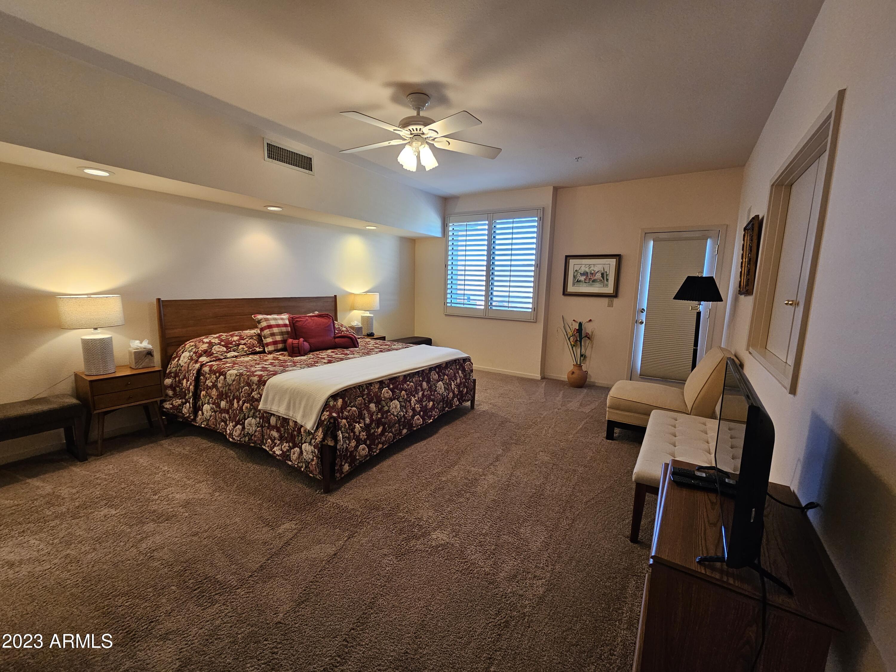 7700 East Gainey Ranch Road, Unit 152 Scottsdale, AZ 85258 - Photo 33 of 44 Upstairs Primary Bedroom