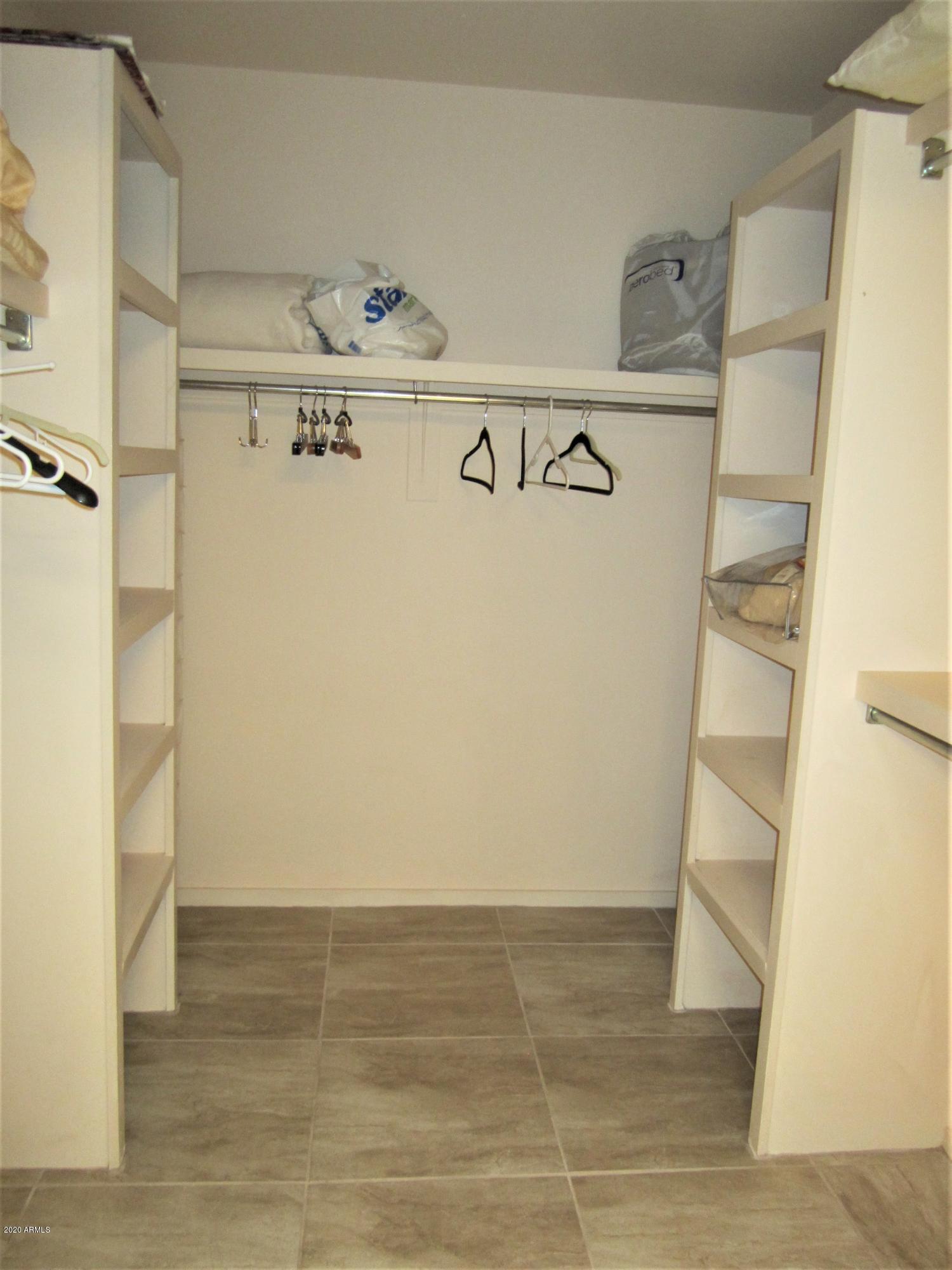 7700 East Gainey Ranch Road, Unit 152 Scottsdale, AZ 85258 - Photo 37 of 44 Walk In Closet