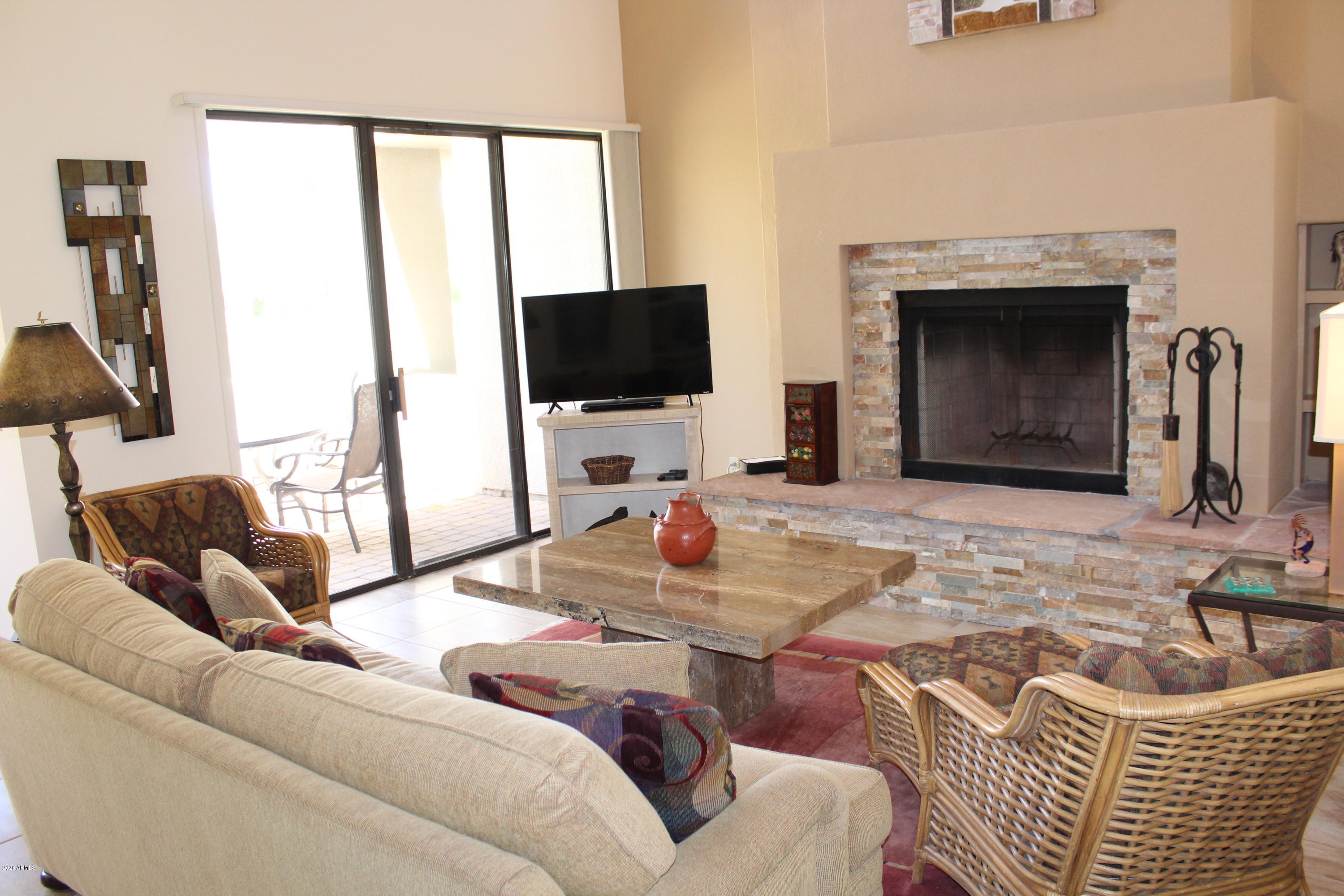 7700 East Gainey Ranch Road, Unit 152 Scottsdale, AZ 85258 - Photo 8 of 44 Great Room with Fireplace