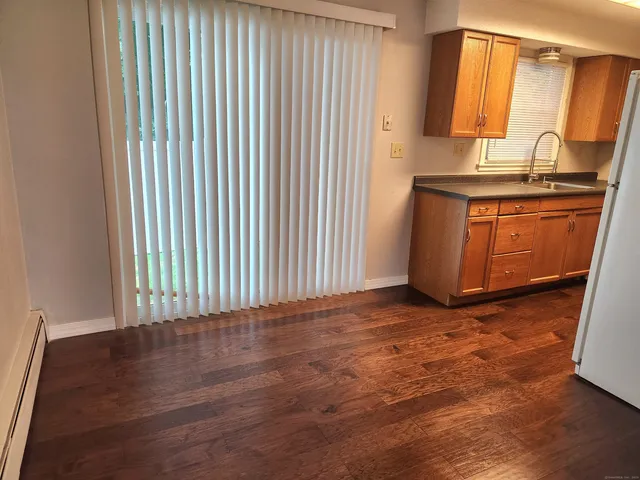 a view of a kitchen with a sink