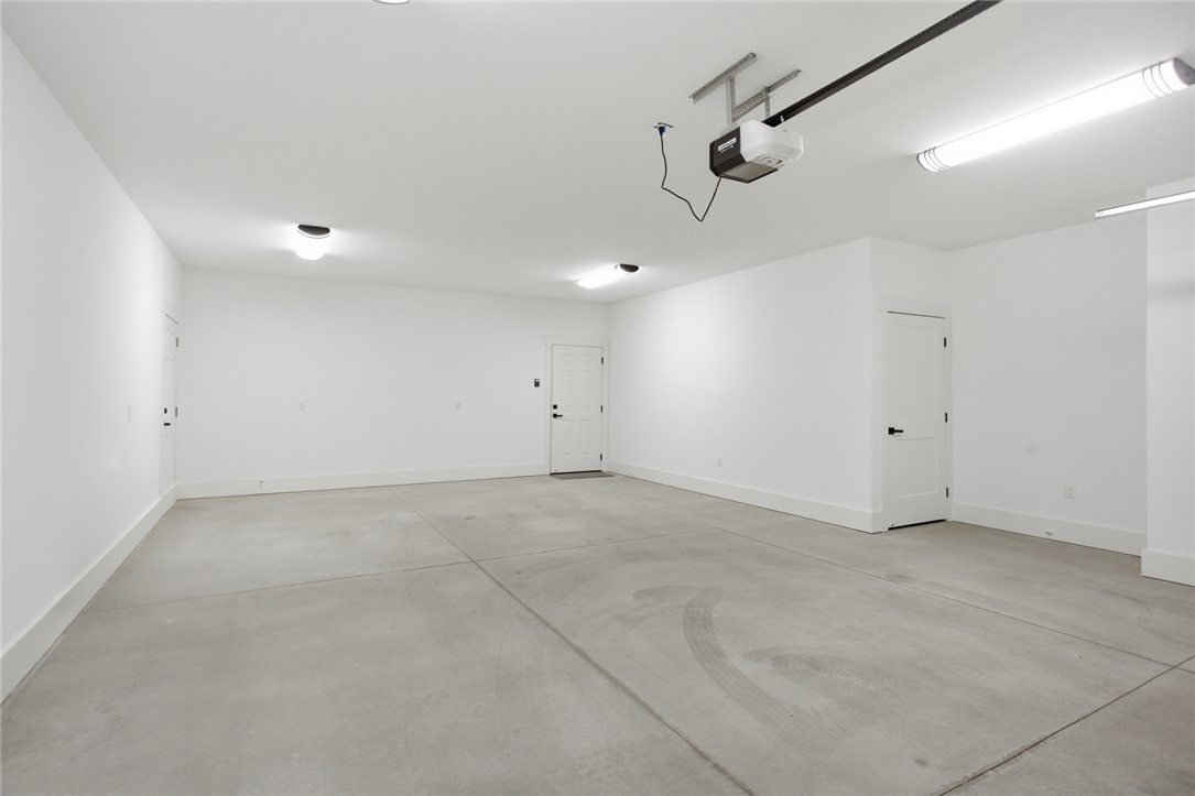 147 McAlister Road West Union, SC 29696 - Photo 37 of 49 This spacious garage offers ample room and direct access to the home.