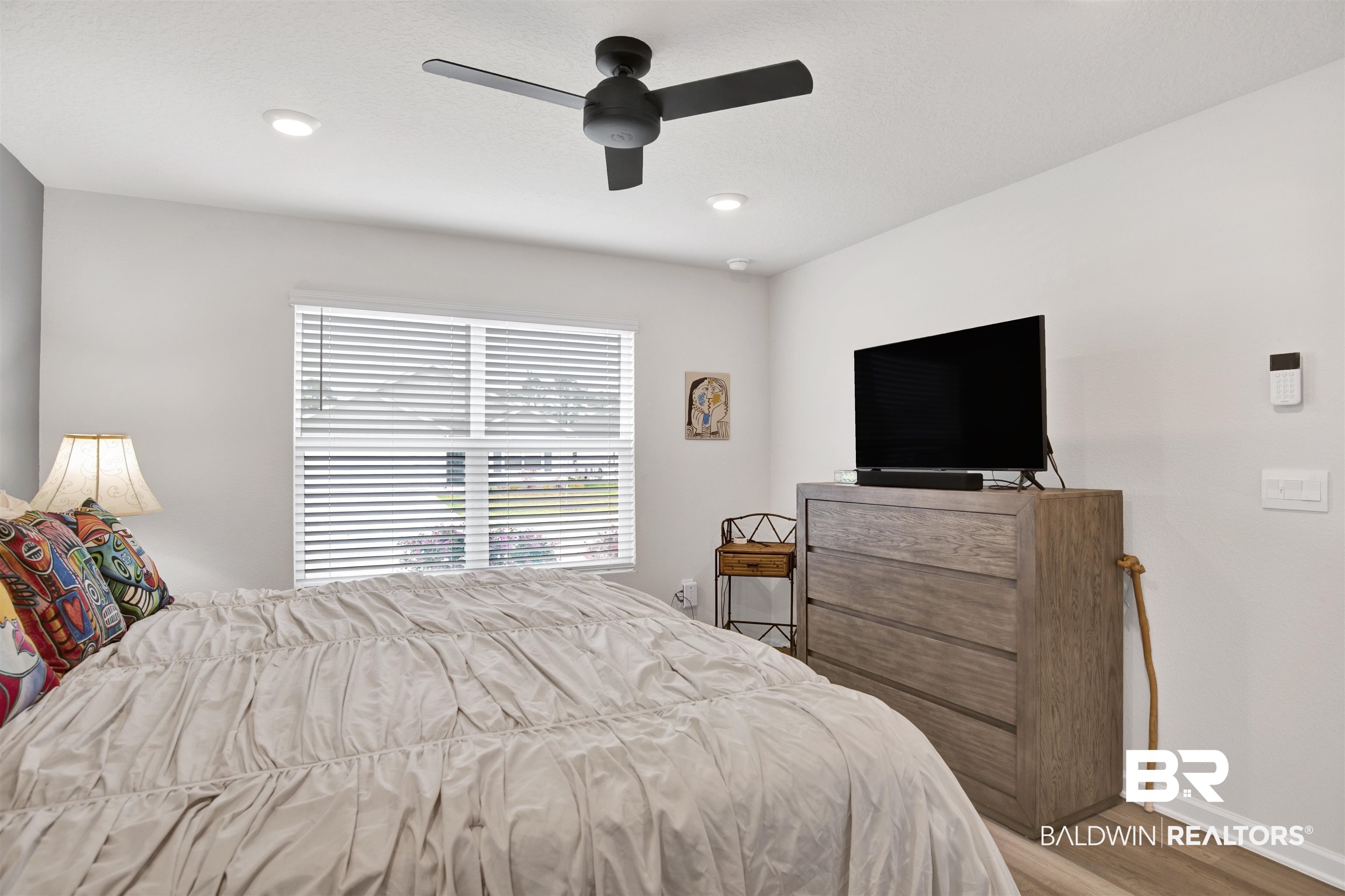 22348 Aleutian Avenue Foley, AL 36535 - Photo 15 of 32 Bedroom with light wood-style flooring and ceiling fan