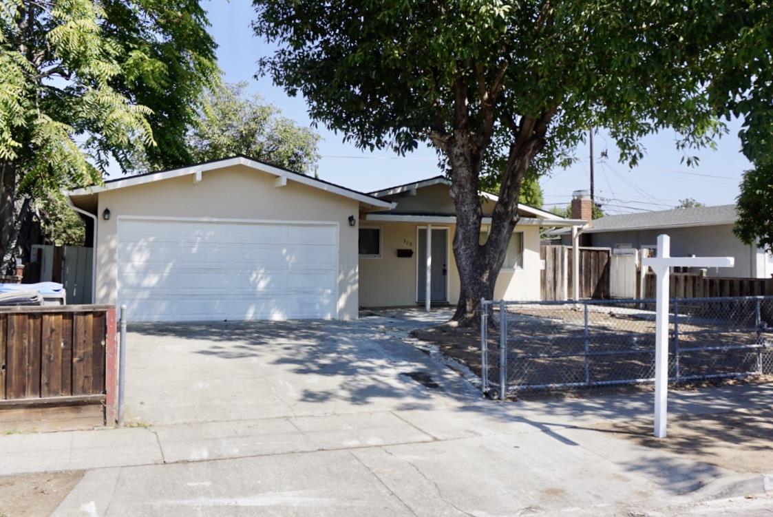 379 Costa Mesa Drive San Jose, CA 95111 - Photo 1 of 21 a front view of a house with a garden