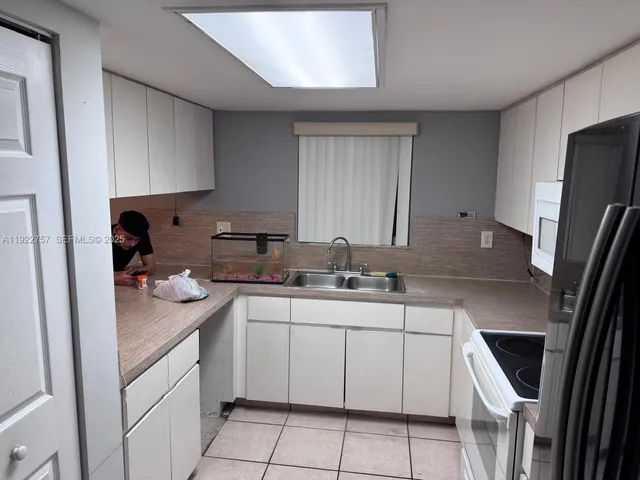 a bathroom with a sink and toilet