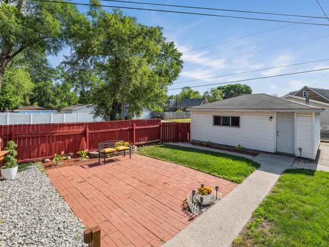 a front view of a house with a garage