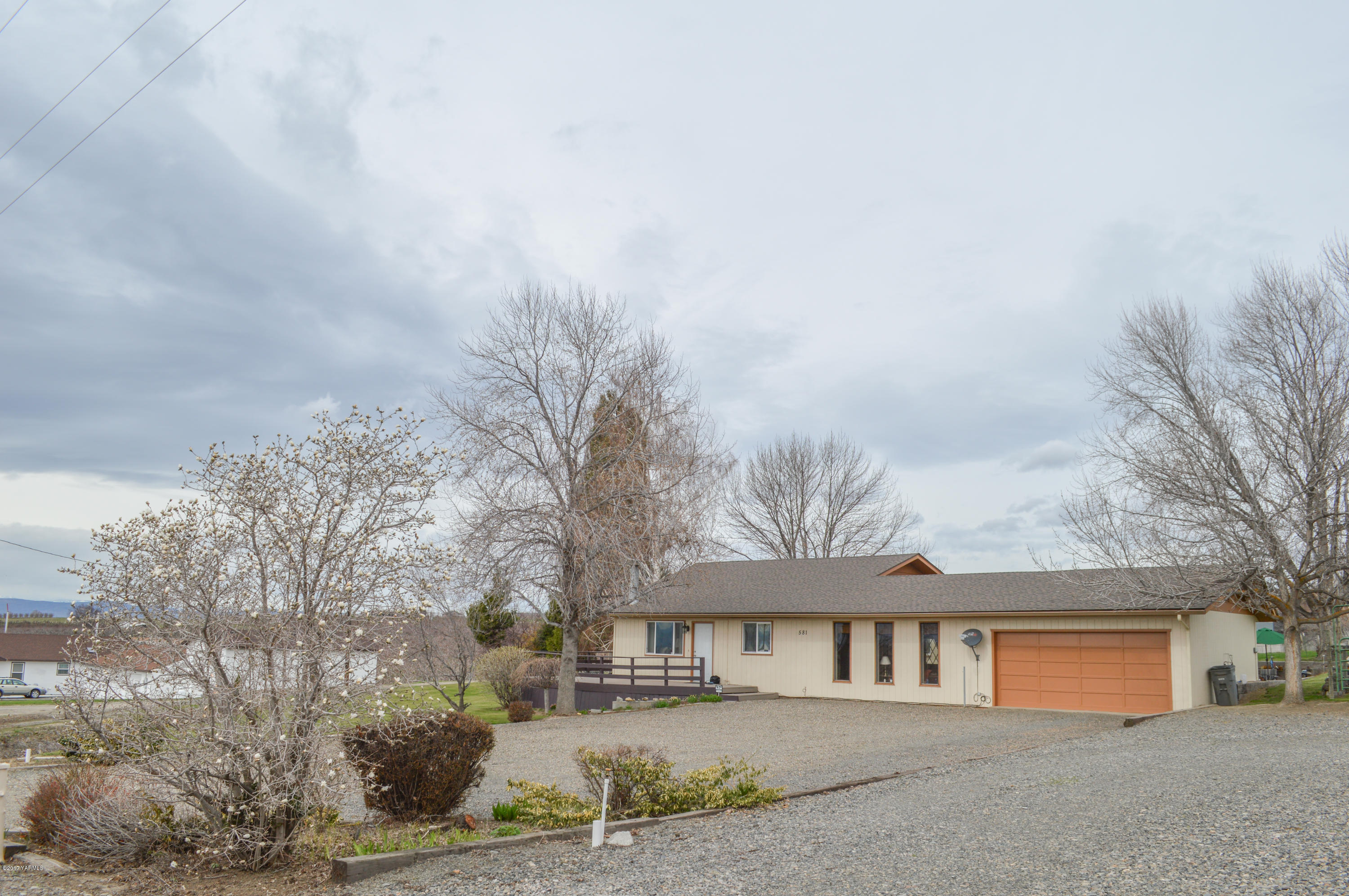 581 Gilbert Road Zillah, WA 98953 - Photo 2 of 38 a view of house with a yard