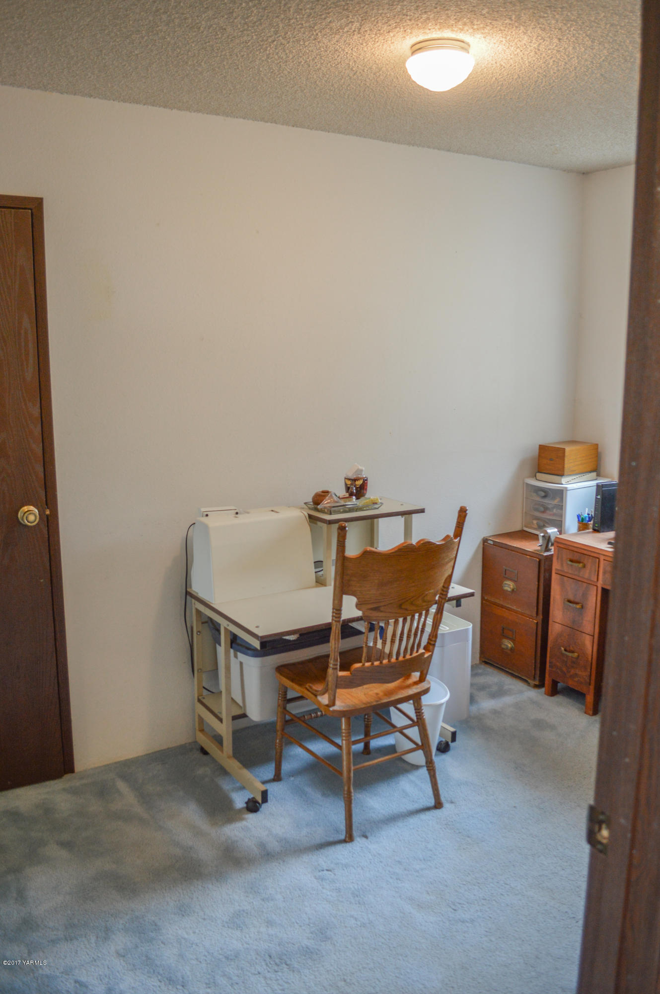 581 Gilbert Road Zillah, WA 98953 - Photo 18 of 38 a view of a workspace with furniture