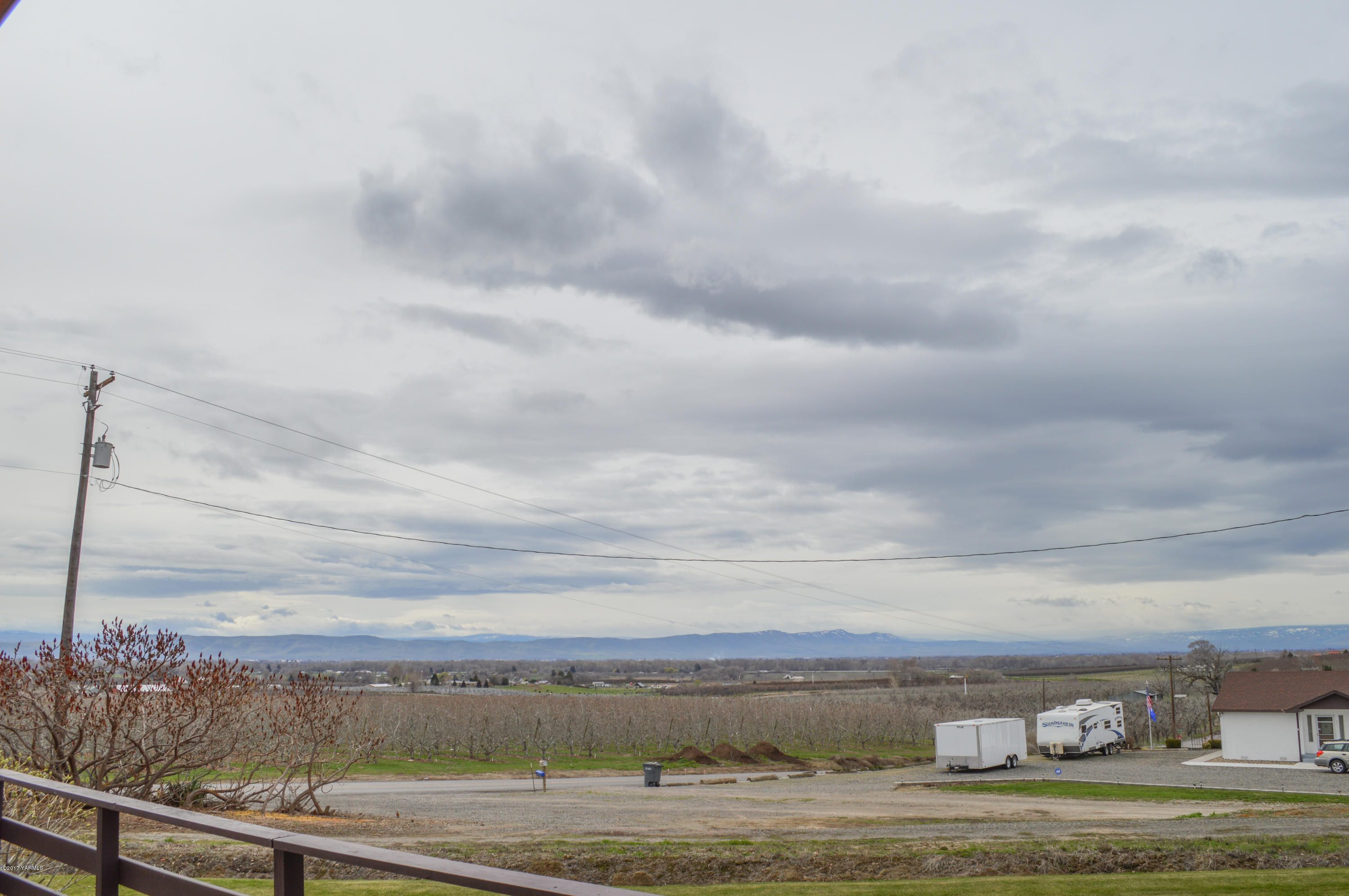 581 Gilbert Road Zillah, WA 98953 - Photo 36 of 38 a view of a lake with a big yard