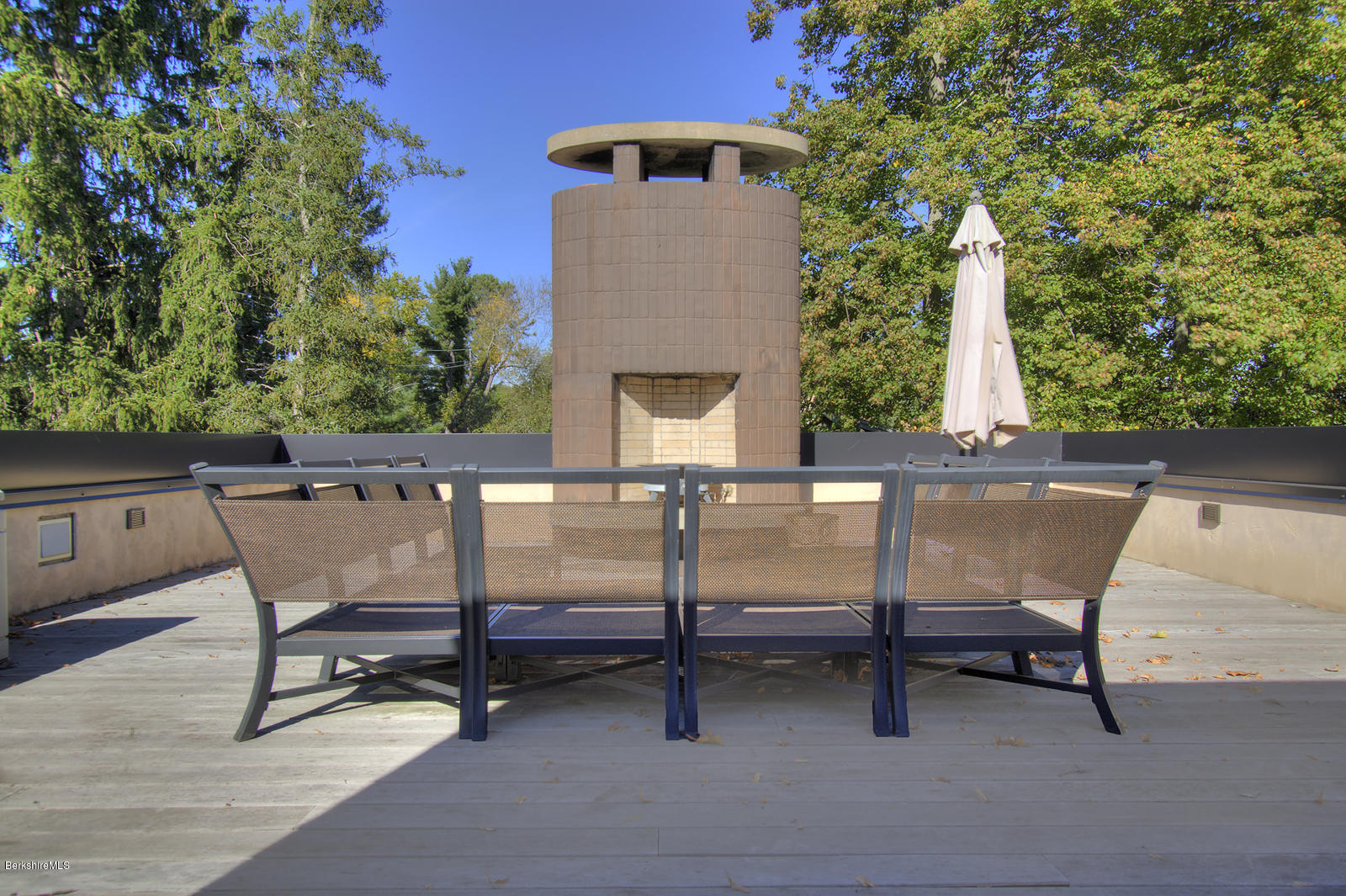121 A Golf Course Road Craryville, NY 12521 - Photo 14 of 19 a view of a chairs and tables in the back yard of the house