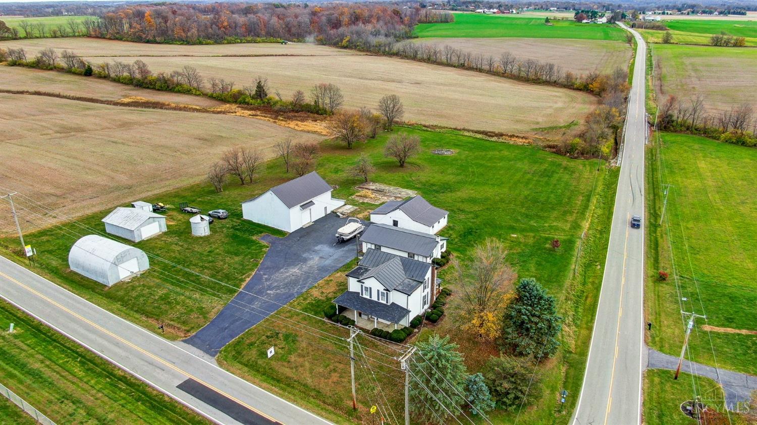 2711 Lebanon Road Clarksville, OH 45113 - Photo 2 of 48 The home sits on 4.18 acres and has 4 outbuildings plus a detached garage with bonus room.