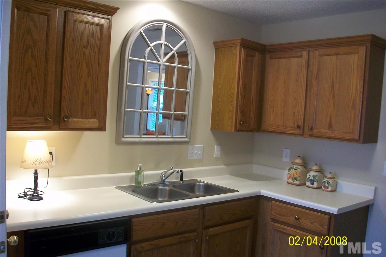 5629 Lighthall Lane Raleigh, NC 27604 - Photo 8 of 13 Your guests will gather in this warm, friendly and spacious kitchen/breakfast room area.