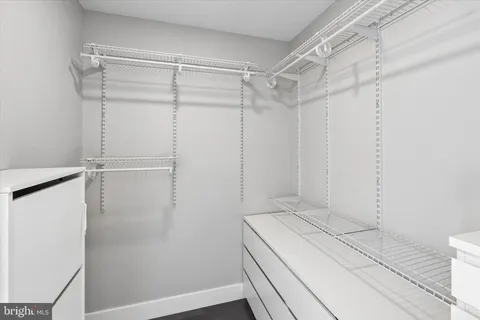 a view of a room with racks on the wall