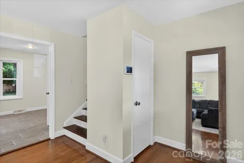 a view of a bedroom with bathroom