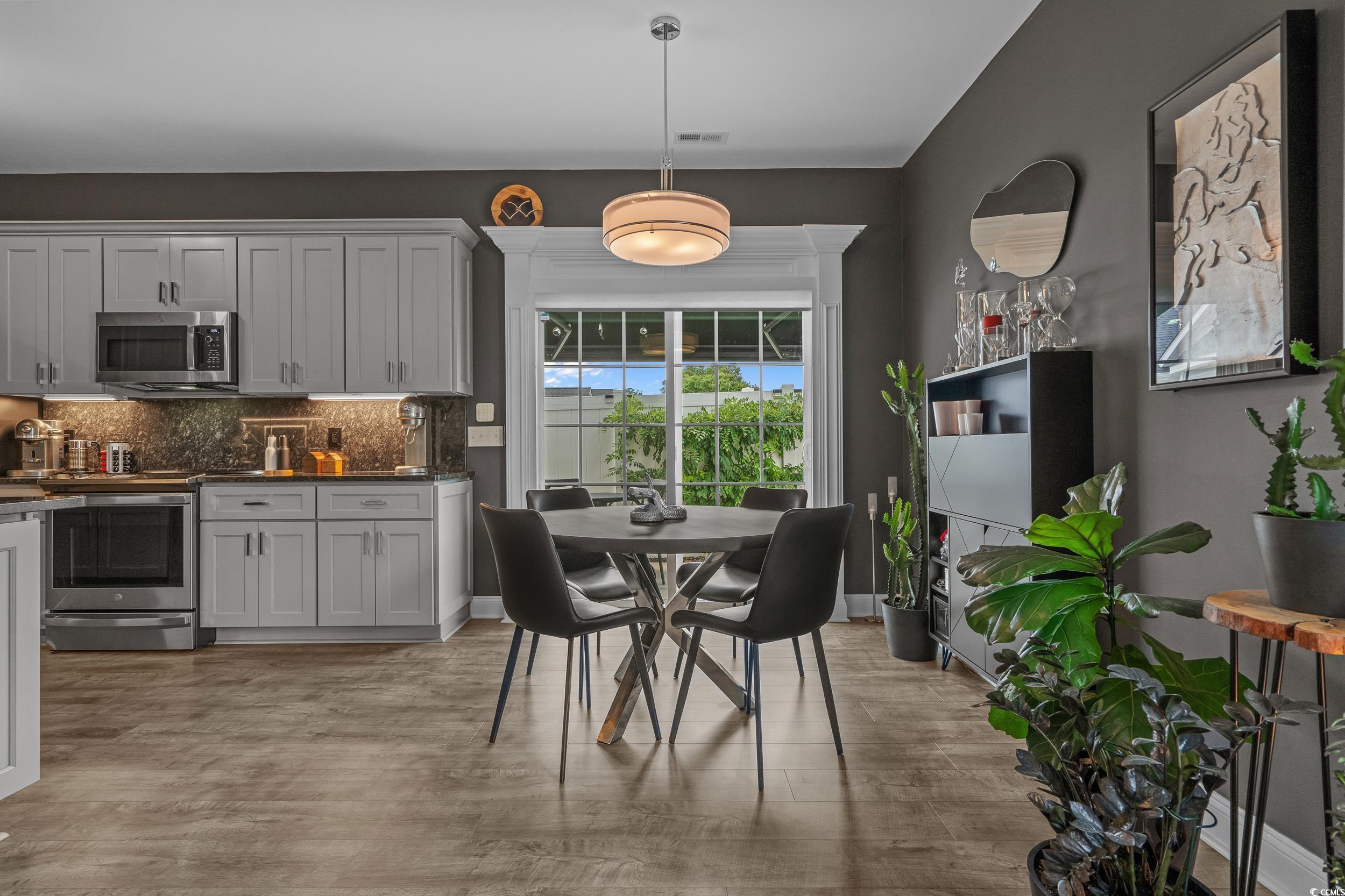 752 Hobonny Loop Longs, SC 29568 - Photo 11 of 40 Dining room with light wood finished floors