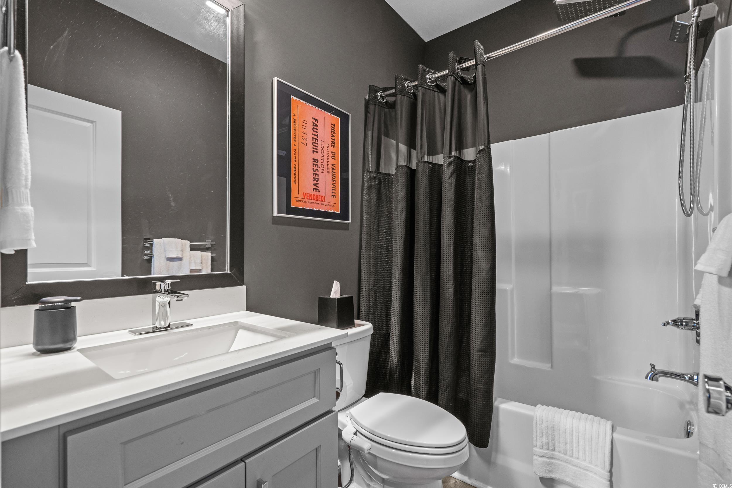 752 Hobonny Loop Longs, SC 29568 - Photo 23 of 40 Bathroom with vanity and shower / tub combo with curtain