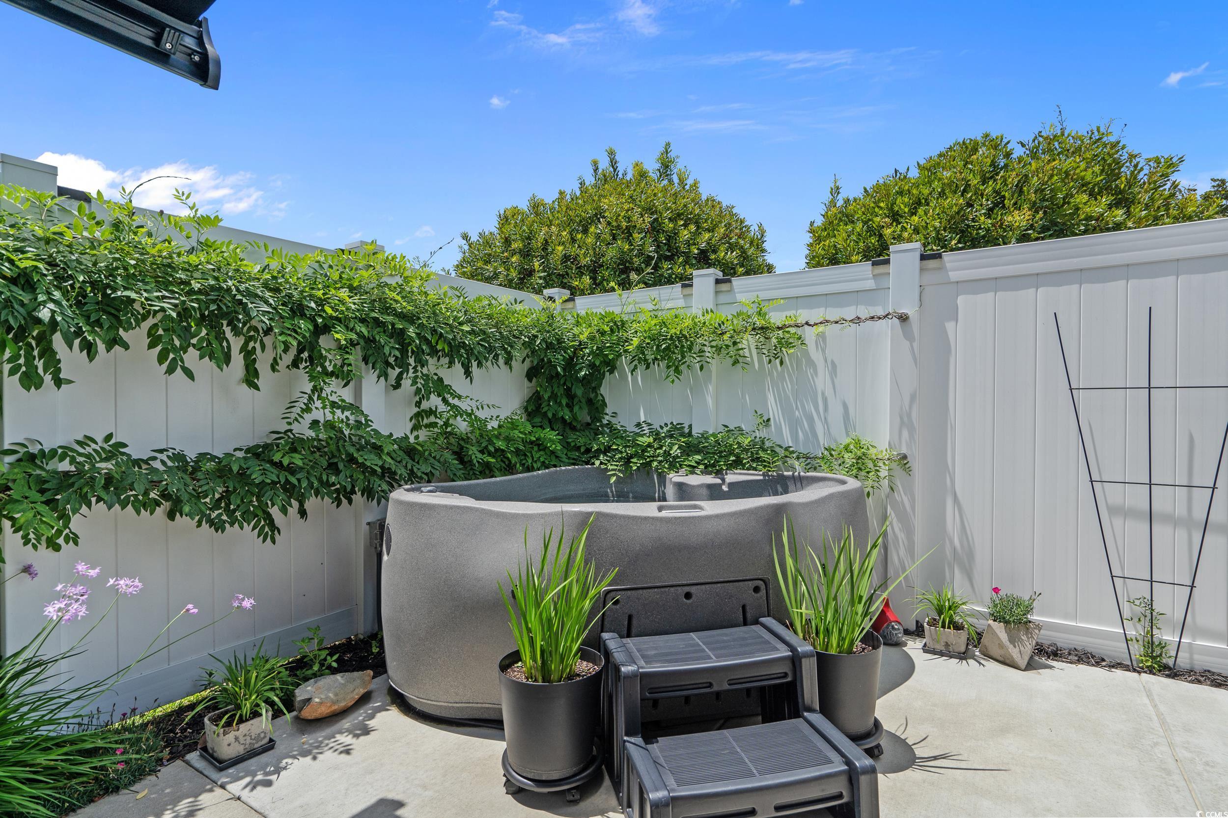 752 Hobonny Loop Longs, SC 29568 - Photo 32 of 40 Fenced backyard with a patio