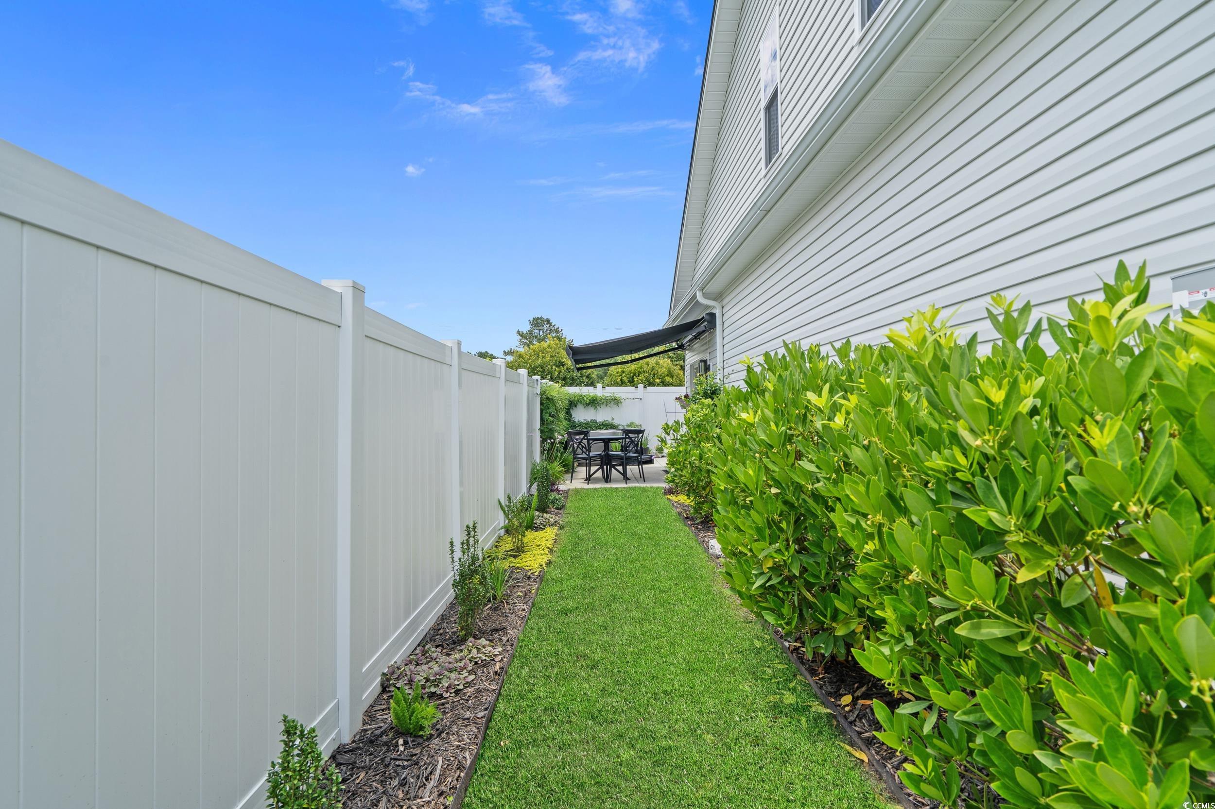 752 Hobonny Loop Longs, SC 29568 - Photo 34 of 40 View of yard with a patio area
