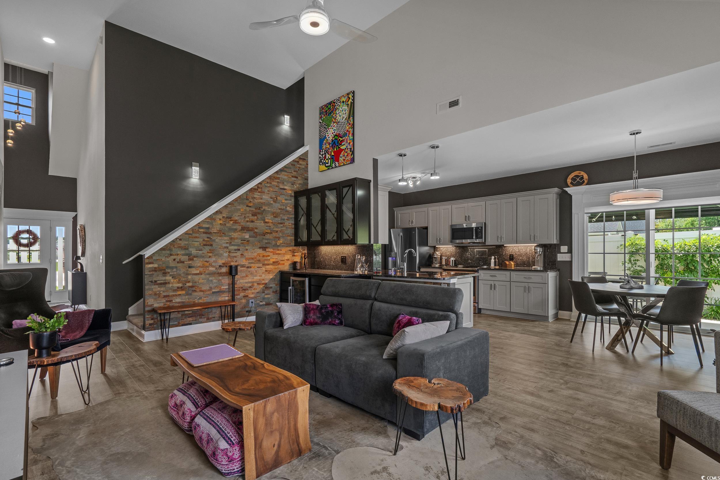 752 Hobonny Loop Longs, SC 29568 - Photo 8 of 40 Living area featuring high vaulted ceiling, a ceiling fan, and light wood-style floors