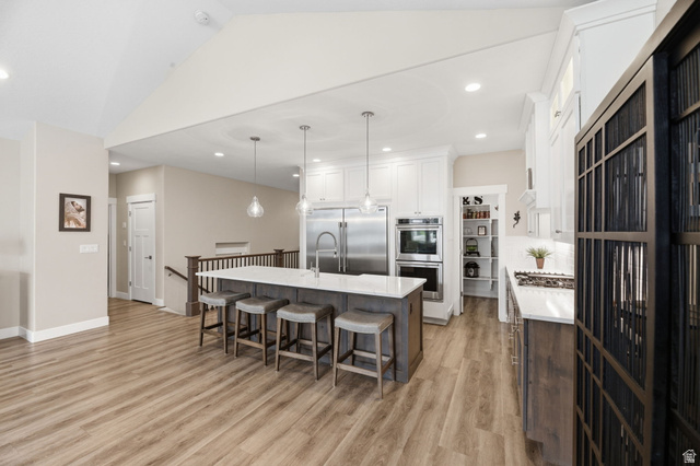 2109 Sunflower Lane Mapleton, UT 84664 - Photo 17 of 43 Gourmet Kitchen w/Gas Cooktop, Double Wall Oven, Extra Large Built-in Refrigerator/Freezer, Extra Long Island w/Farm Style Sink! Oversized Walk-in Pantry!