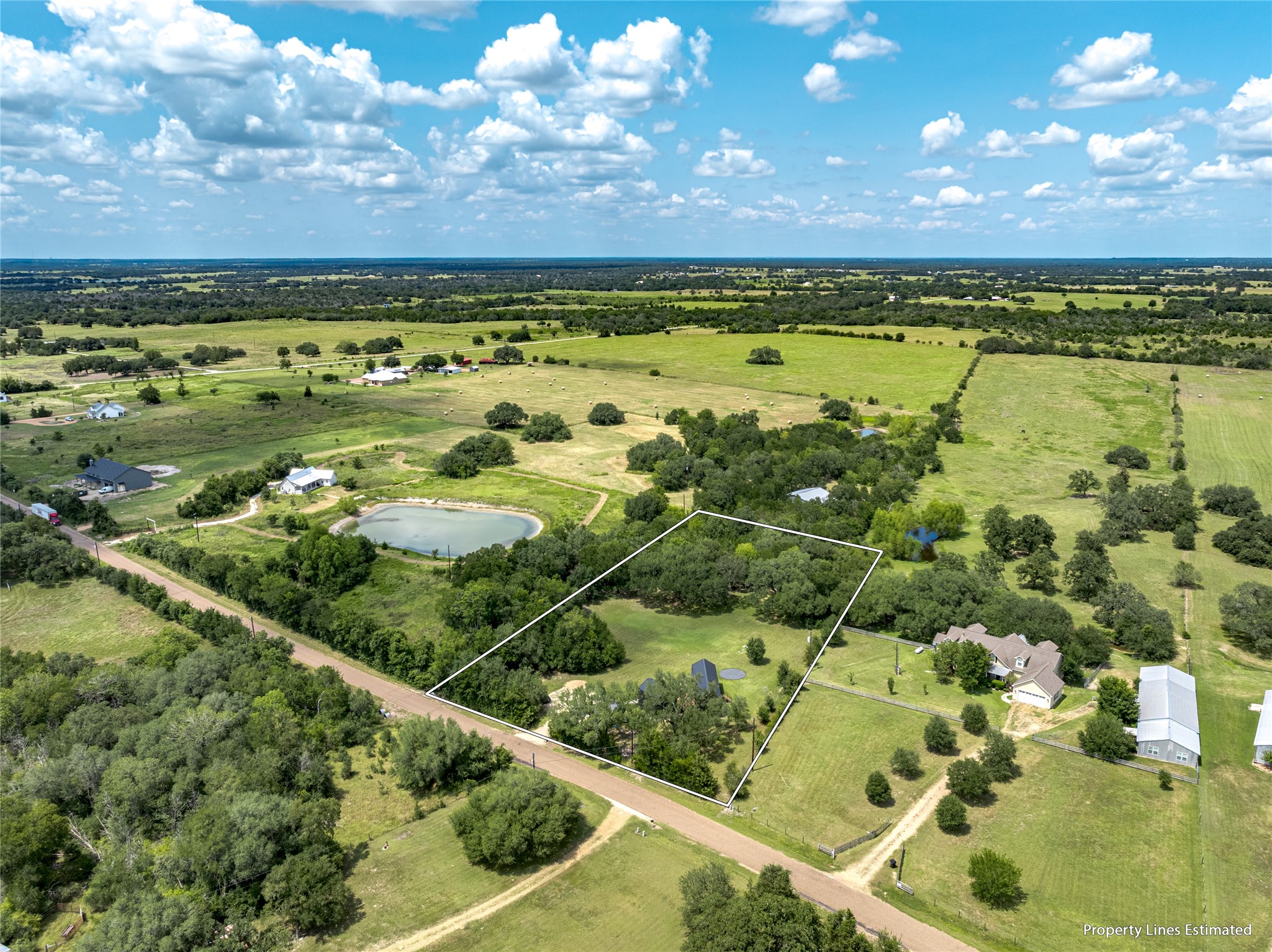 8390 Schuster Road Ledbetter, TX 78946 - Photo 23 of 27 a view of a city