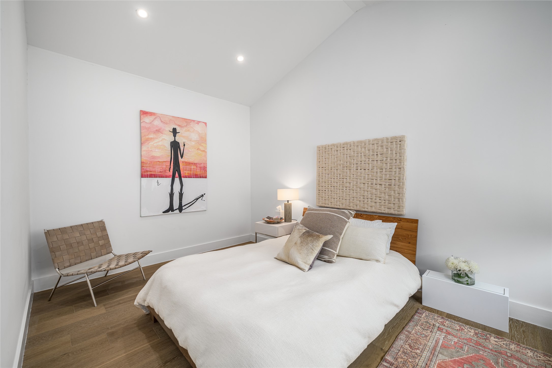 8390 Schuster Road Ledbetter, TX 78946 - Photo 8 of 27 a bedroom with a bed and a lamp