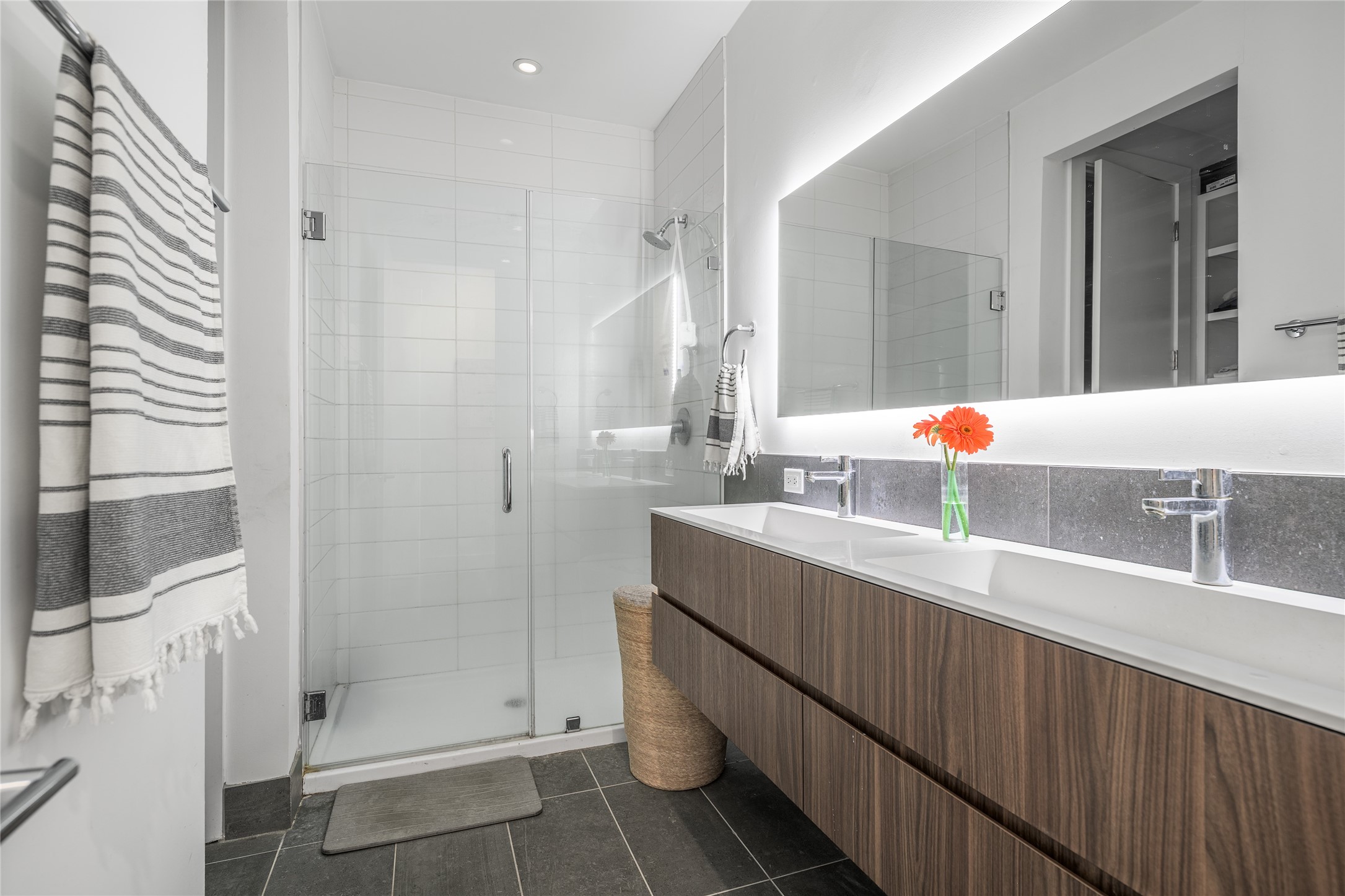 8390 Schuster Road Ledbetter, TX 78946 - Photo 10 of 27 a bathroom with a double vanity sink mirror and shower