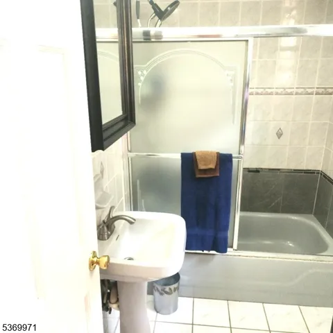 a view of a porch with seating space