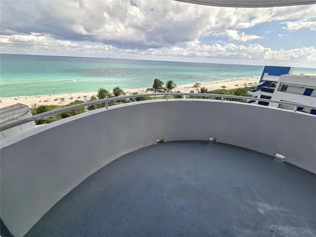 a lobby with furniture and window