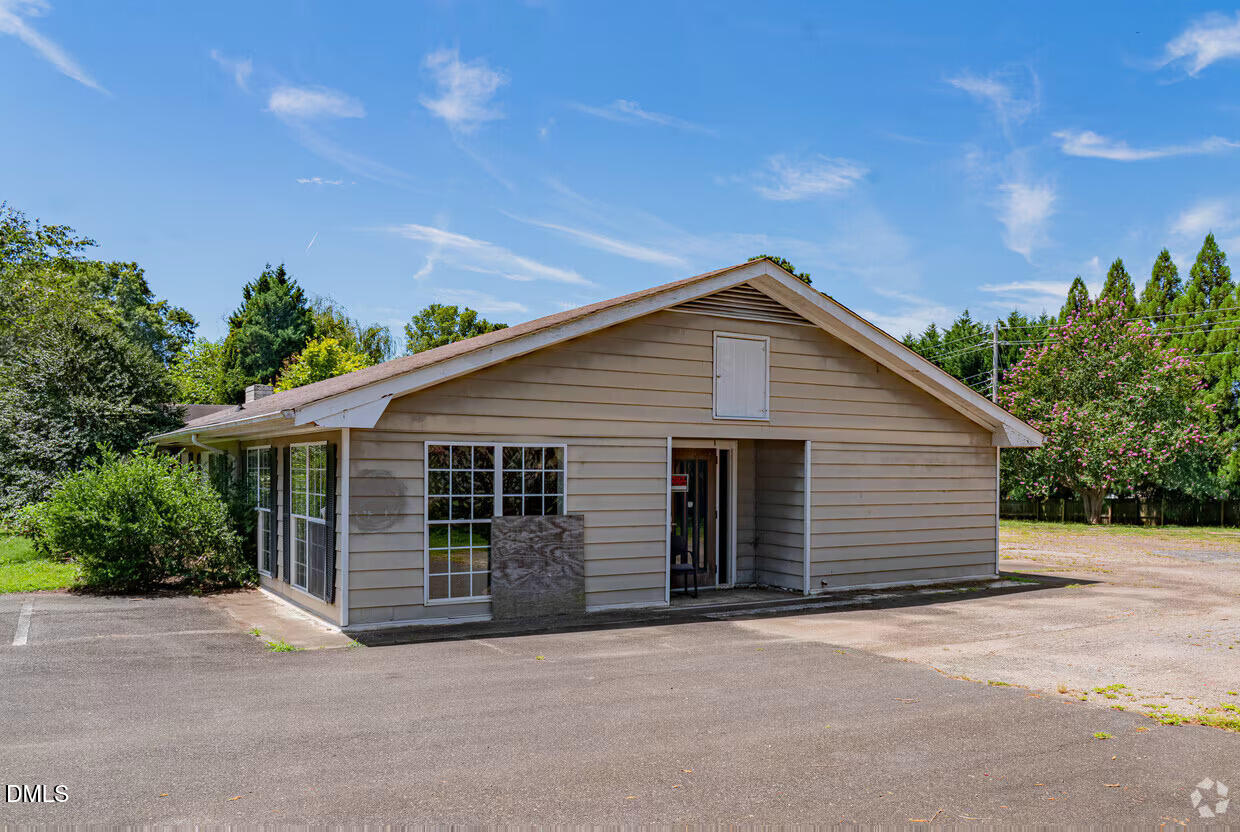 306 South Allen Road Wake Forest, NC 27587 - Photo 11 of 48 a view of a house with a yard and garage
