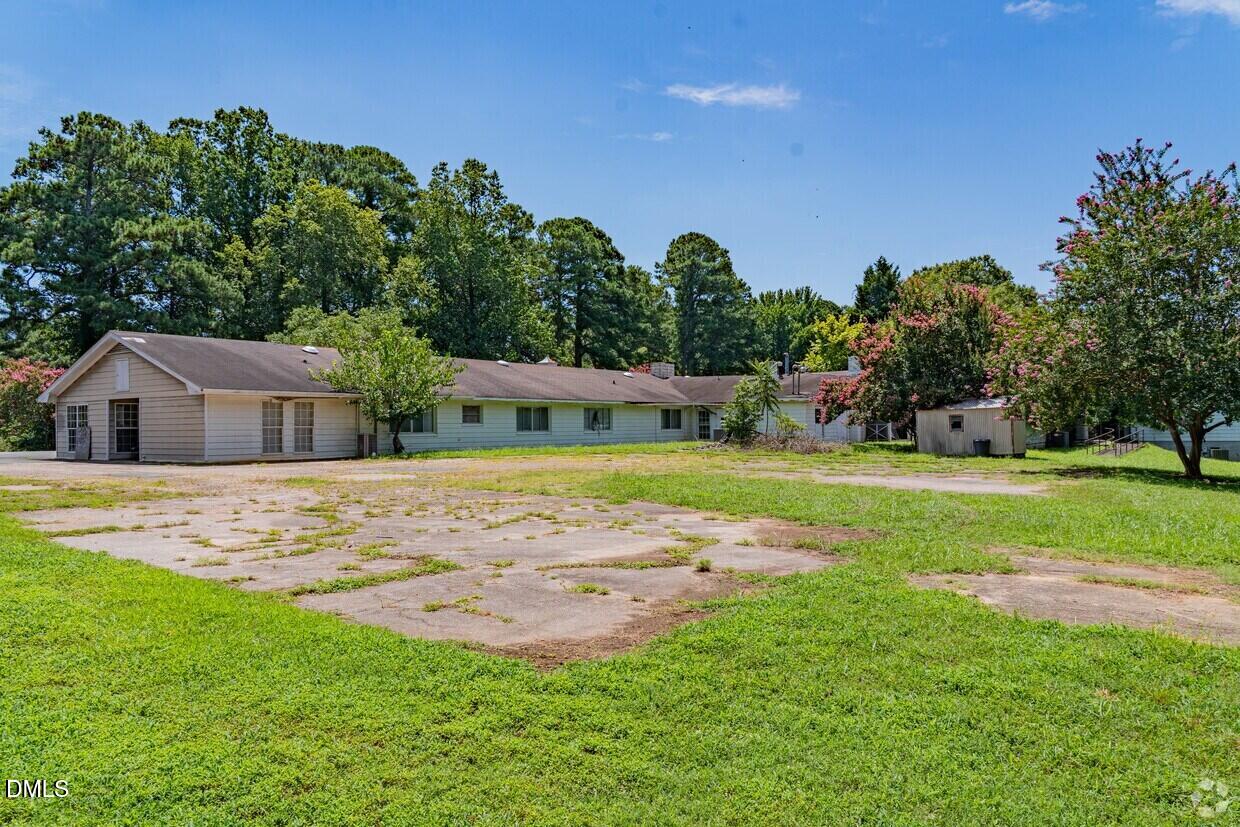 306 South Allen Road Wake Forest, NC 27587 - Photo 12 of 48 a view of a house with a yard