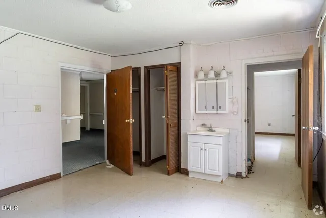 a view of room with window and hardwood floor
