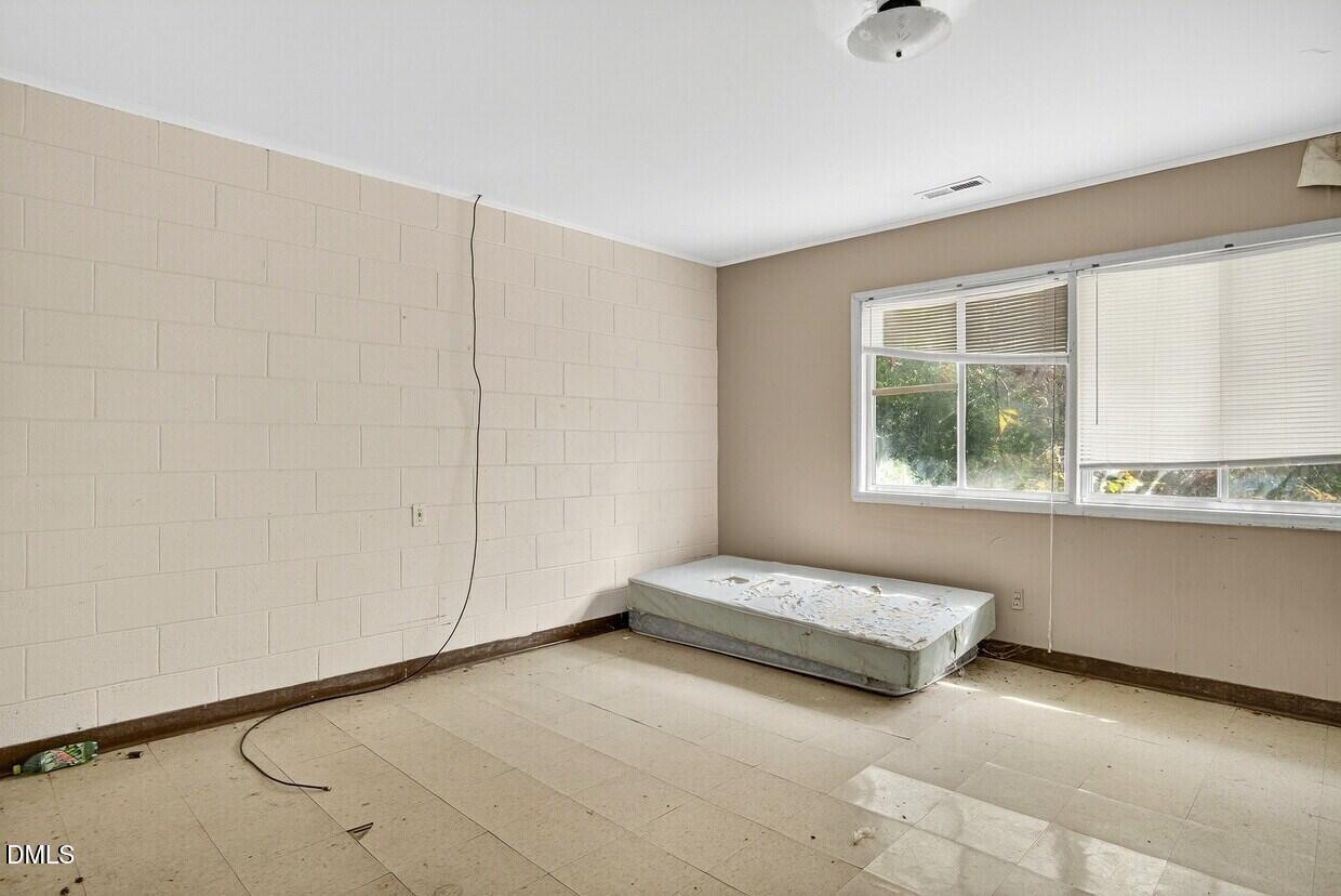 306 South Allen Road Wake Forest, NC 27587 - Photo 17 of 48 a view of room with window and hardwood floor