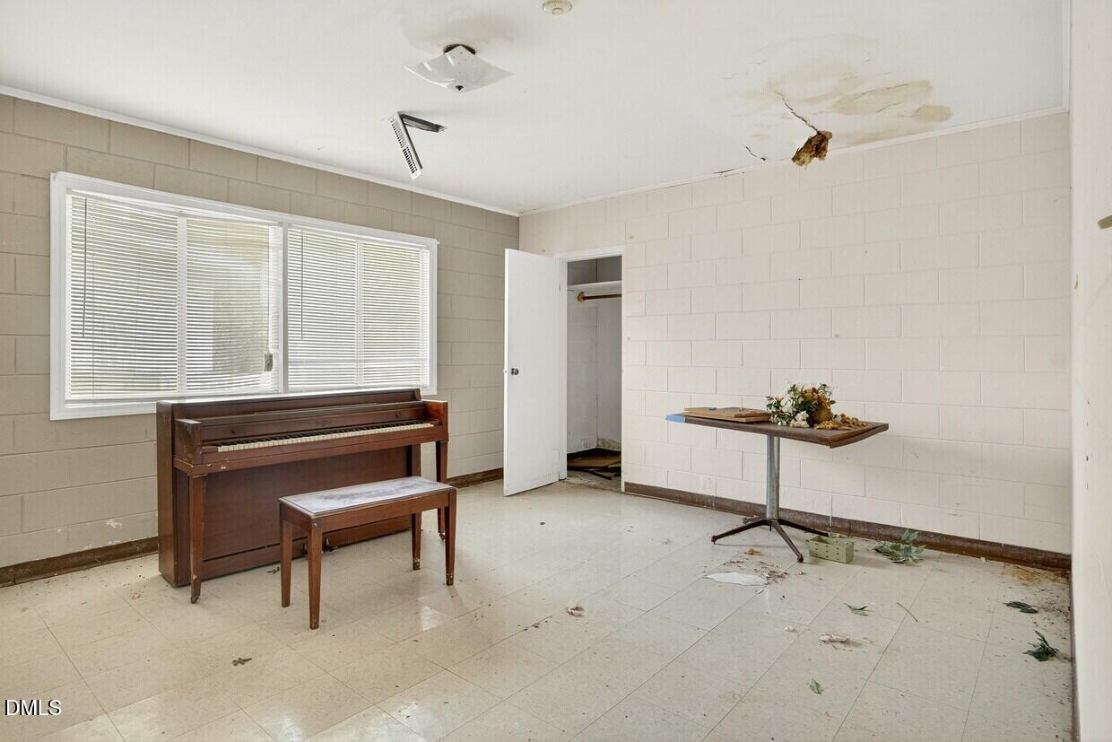 306 South Allen Road Wake Forest, NC 27587 - Photo 20 of 48 a room with a bed and a dresser