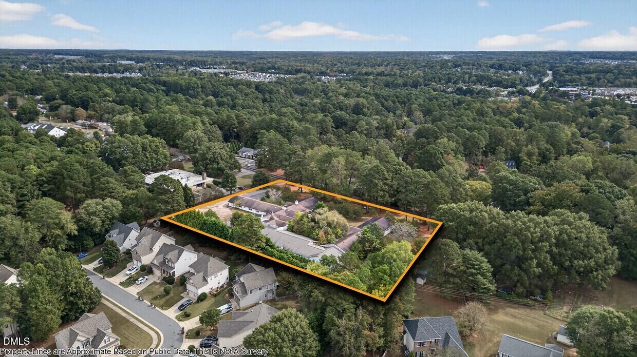 306 South Allen Road Wake Forest, NC 27587 - Photo 2 of 48 an aerial view of a residential houses with city view