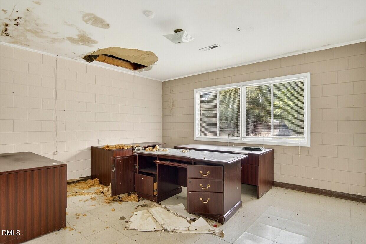 306 South Allen Road Wake Forest, NC 27587 - Photo 21 of 48 a view of a workspace with furniture and window