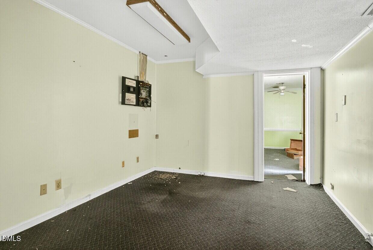 306 South Allen Road Wake Forest, NC 27587 - Photo 22 of 48 an empty room with an entryway