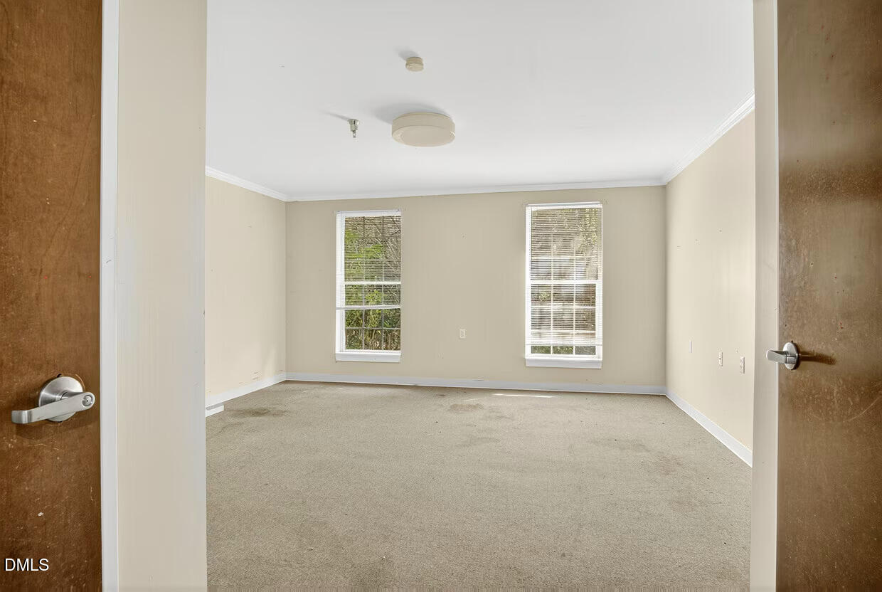 306 South Allen Road Wake Forest, NC 27587 - Photo 24 of 48 an empty room with windows