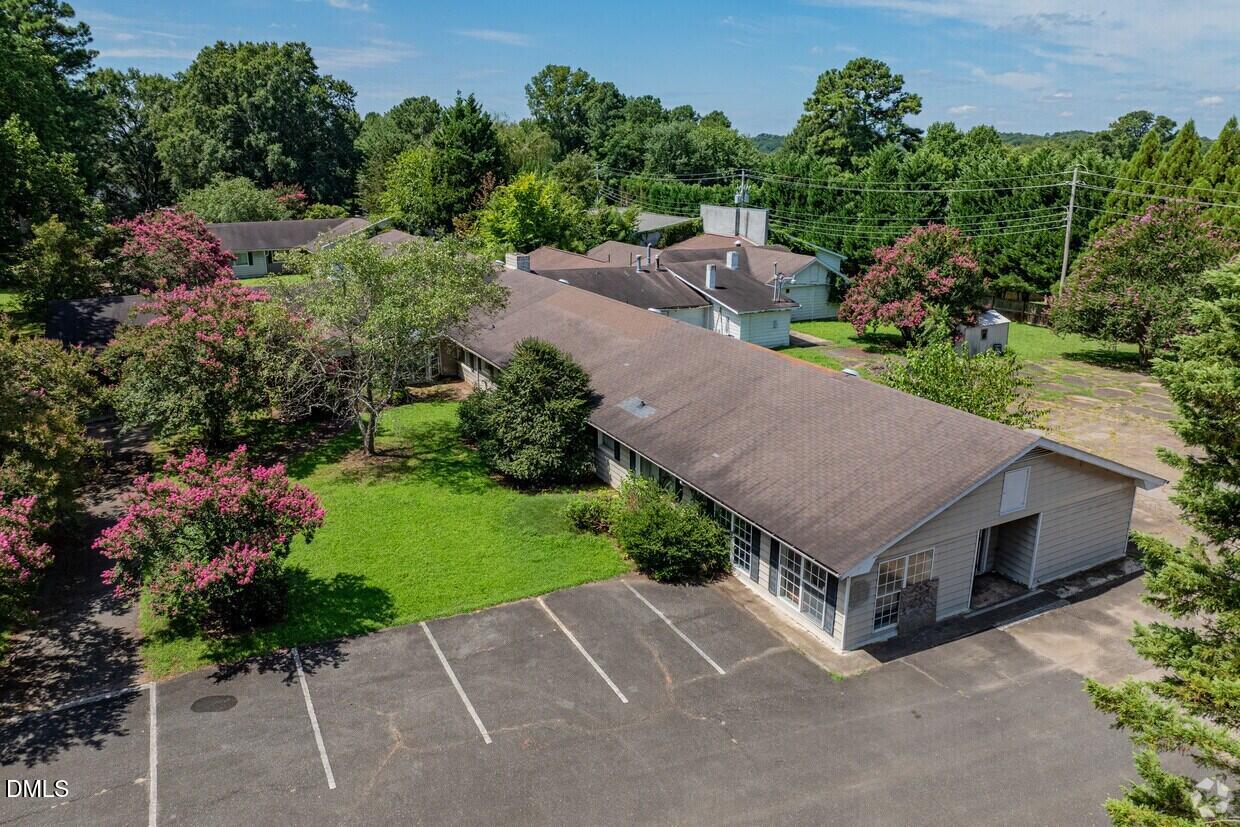 306 South Allen Road Wake Forest, NC 27587 - Photo 3 of 48 an aerial view of a house having yard