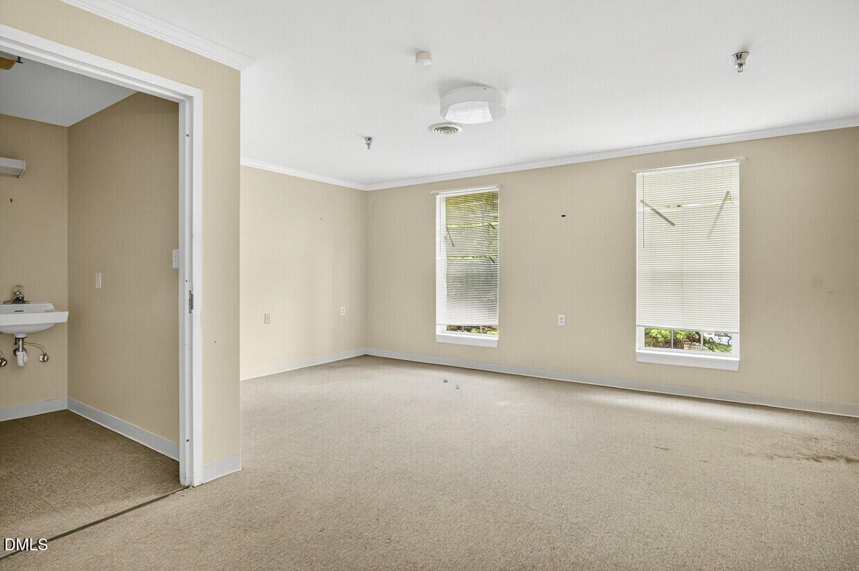 306 South Allen Road Wake Forest, NC 27587 - Photo 33 of 48 an empty room with windows and sink