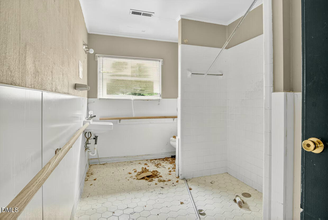 306 South Allen Road Wake Forest, NC 27587 - Photo 34 of 48 a bathroom with a bathtub and a shower