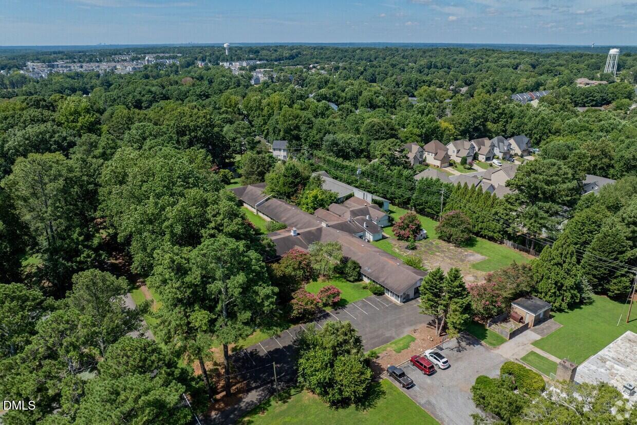 306 South Allen Road Wake Forest, NC 27587 - Photo 44 of 48 an aerial view of a house with a yard