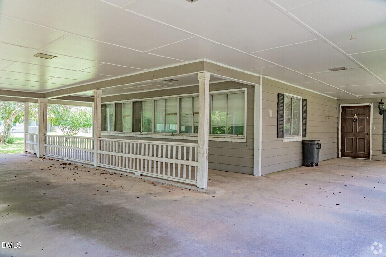 306 South Allen Road Wake Forest, NC 27587 - Photo 10 of 48 a view of a big room with windows