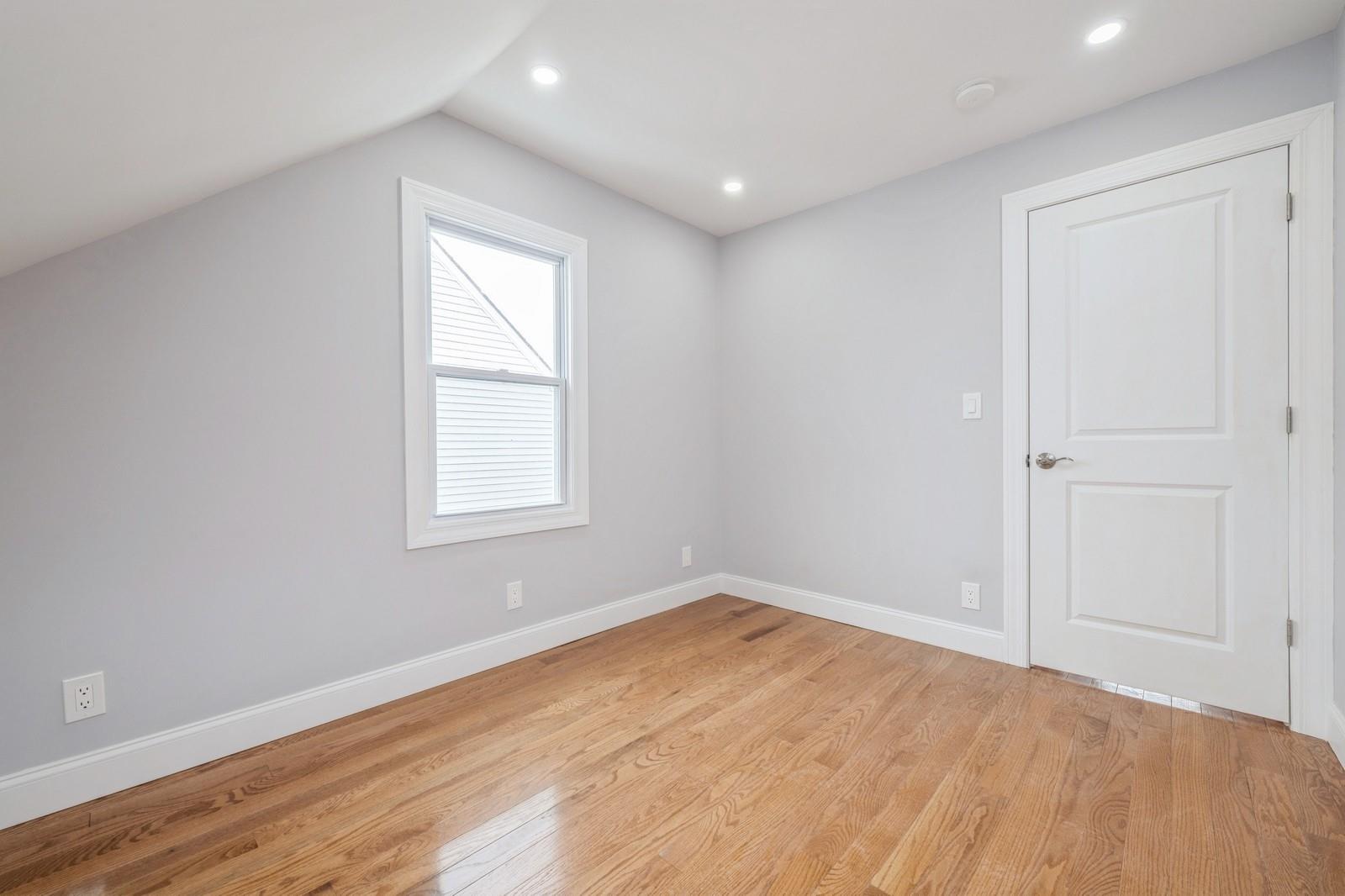 246-59 86th Road Queens, NY 11426 - Photo 27 of 44 Bonus room with vaulted ceiling and light wood-type flooring