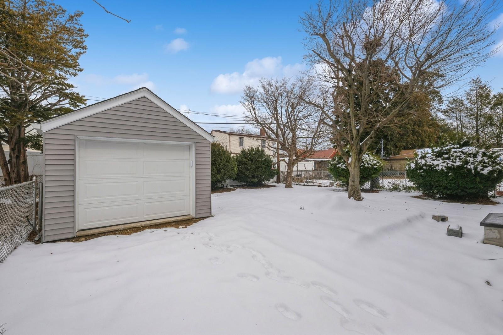 246-59 86th Road Queens, NY 11426 - Photo 40 of 44 View of snow covered garage