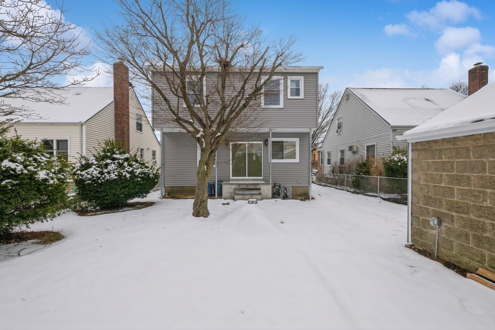 246-59 86th Road Queens, NY 11426 - Photo 42 of 44 View of snow covered back of property