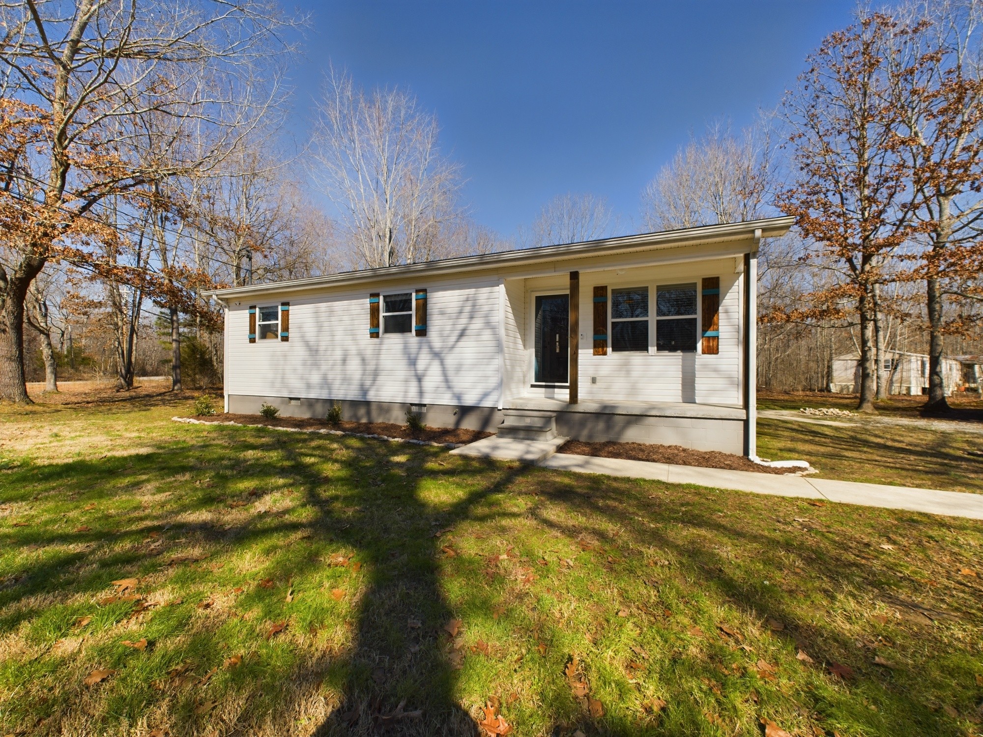 17 Alice Boynton Road Manchester, TN 37355 - Photo 1 of 31 a front view of a house with a yard