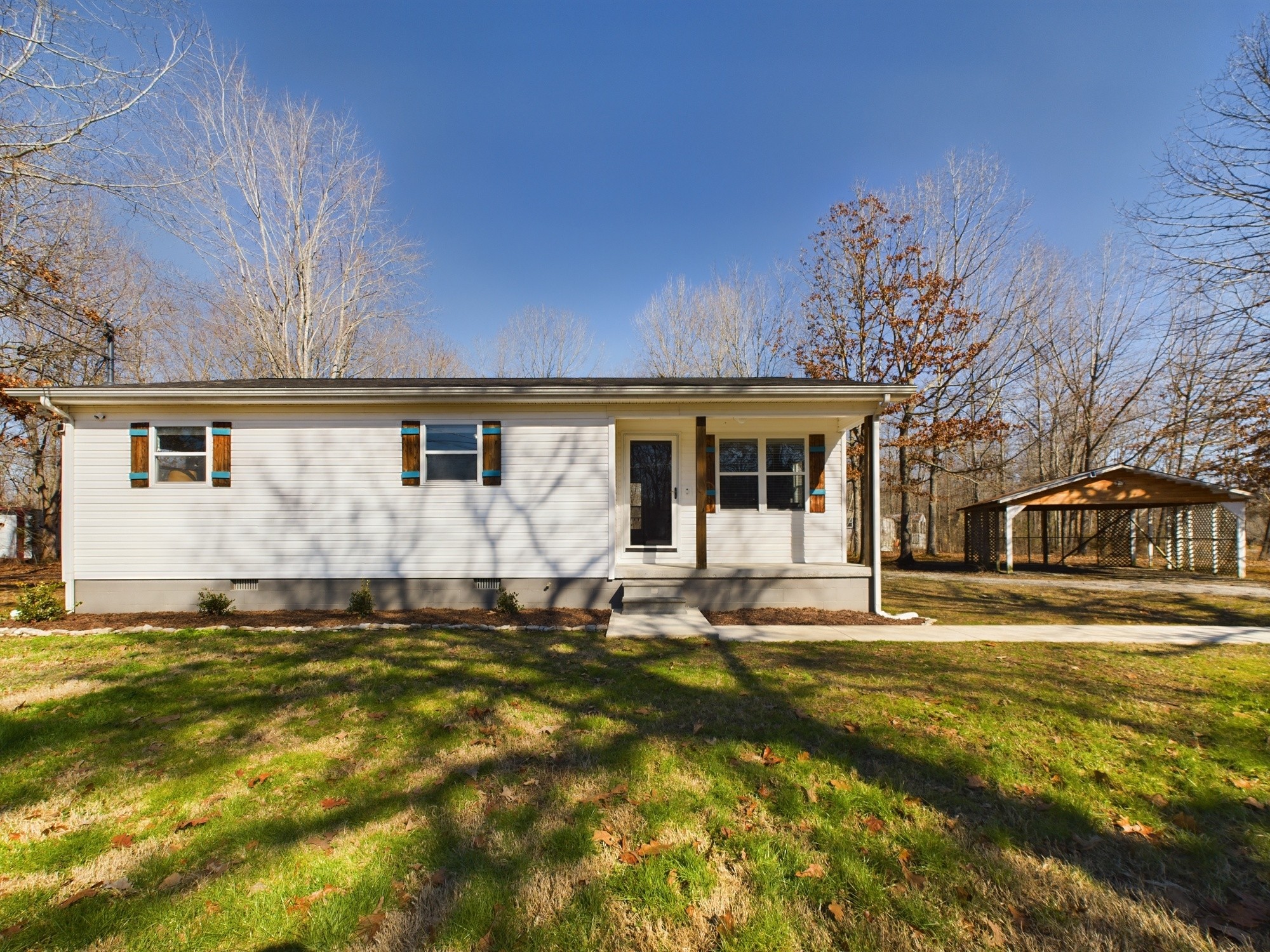 17 Alice Boynton Road Manchester, TN 37355 - Photo 2 of 31 a front view of house with yard and seating
